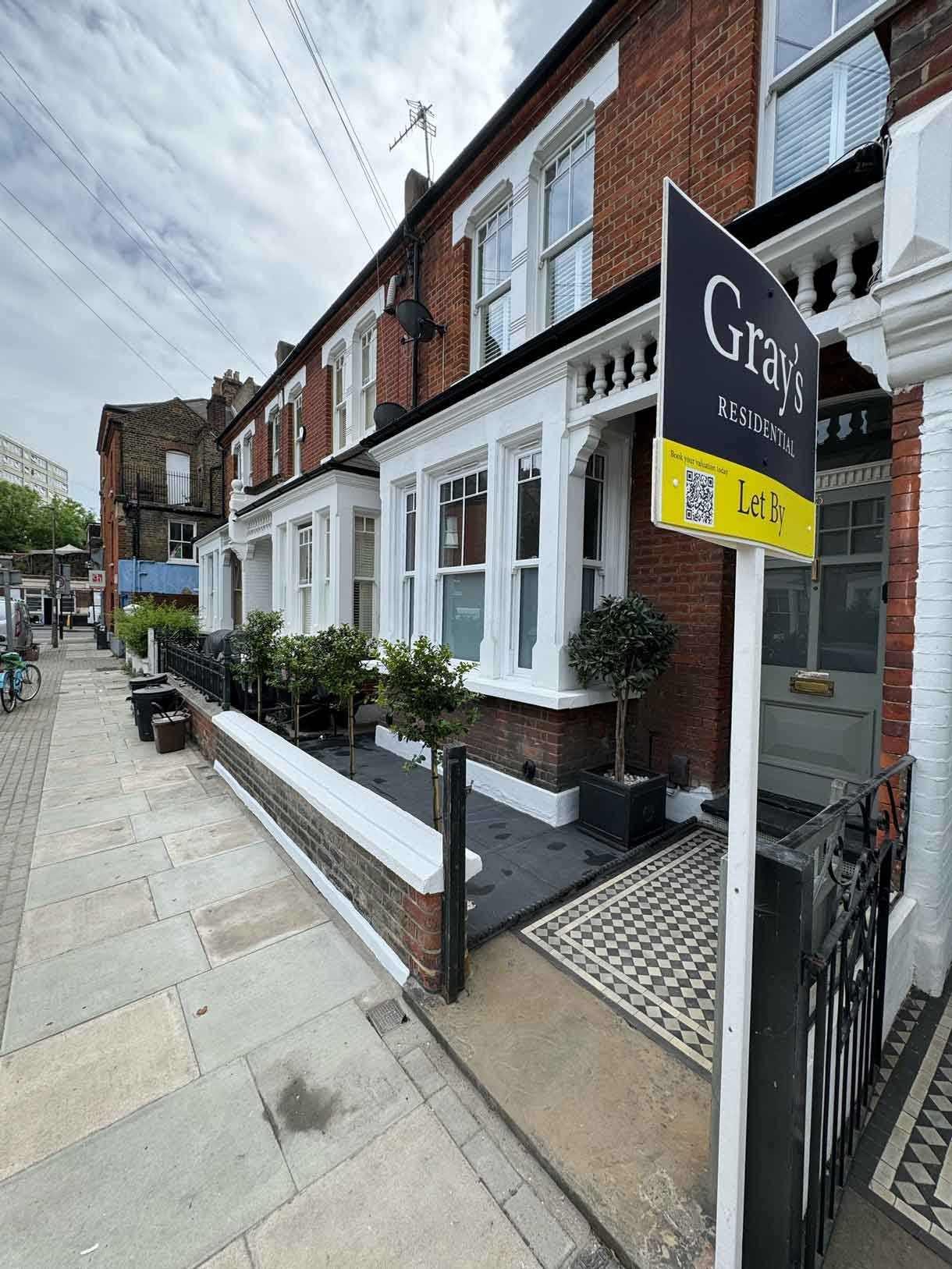 Front garden in Battersea with black porcelain tiles