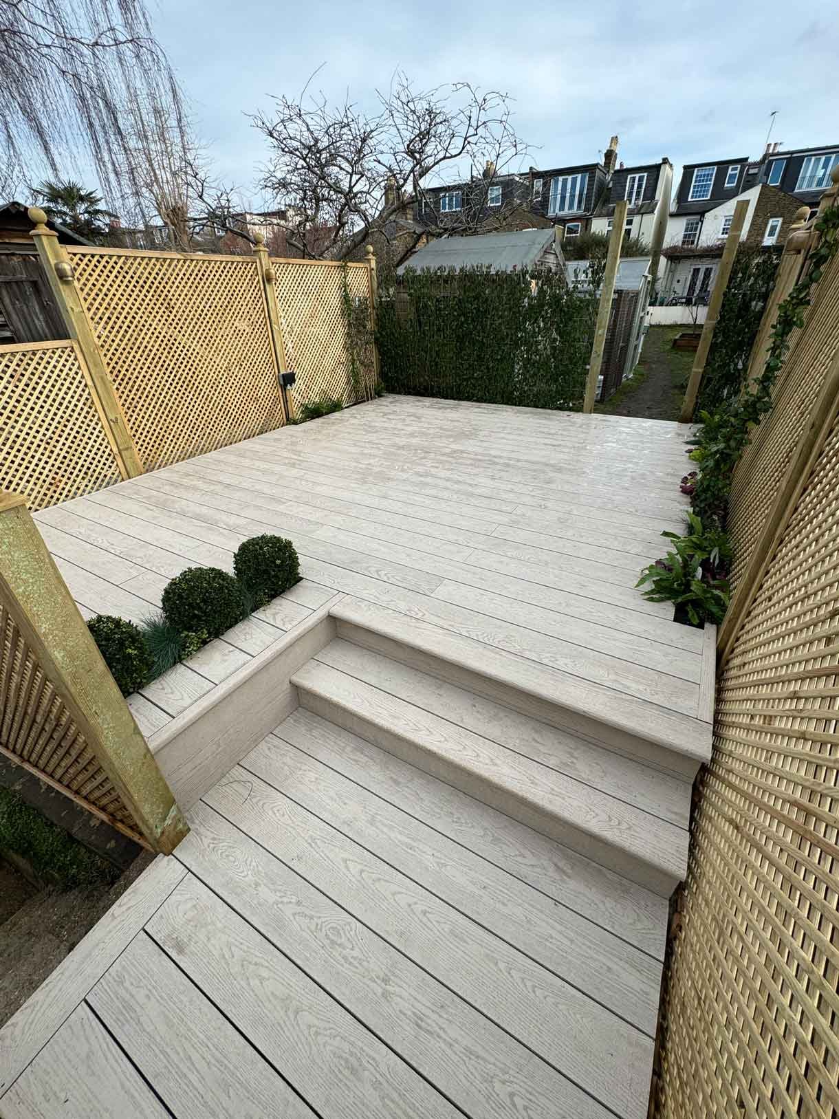 Aerial image of back garden down by the river with composite decking.