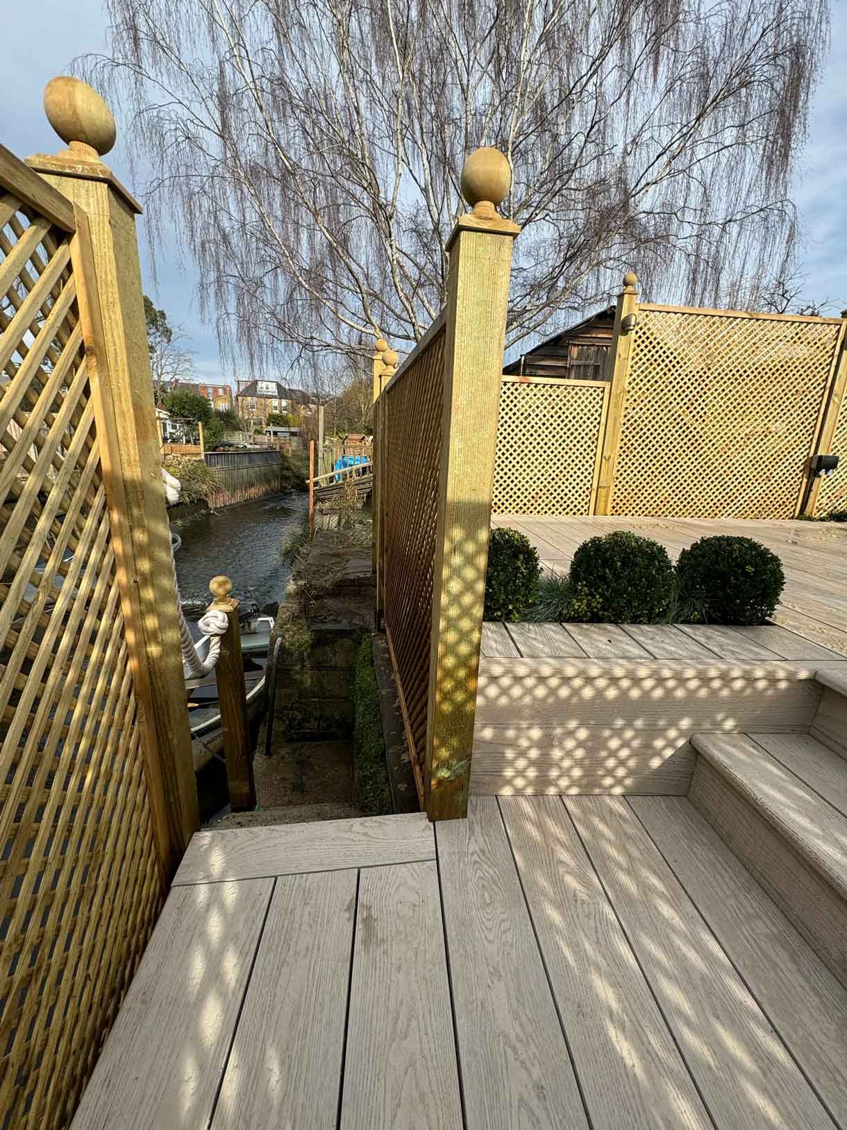 Aerial image of back garden down by the river with composite decking.