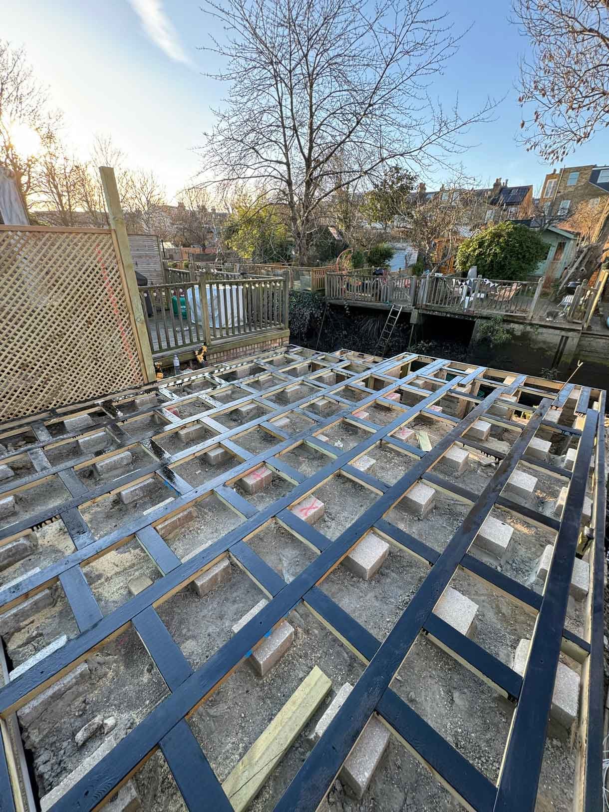 Construction images of a landscaping project of a circular bench.