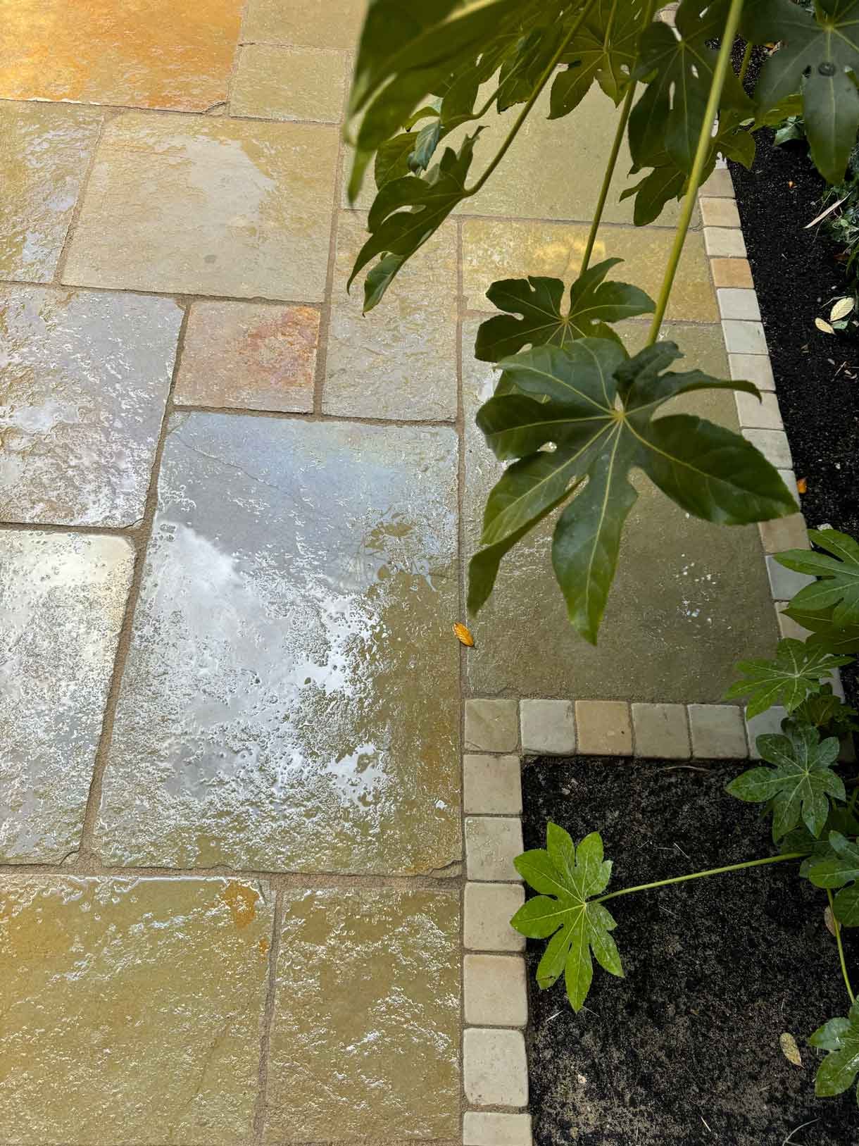 A new limestone patio in the project pack pattern. Beige and warm yellow colours.