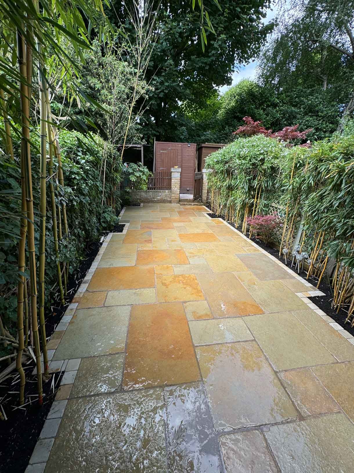 A new limestone patio in the project pack pattern. Beige and warm yellow colours.
