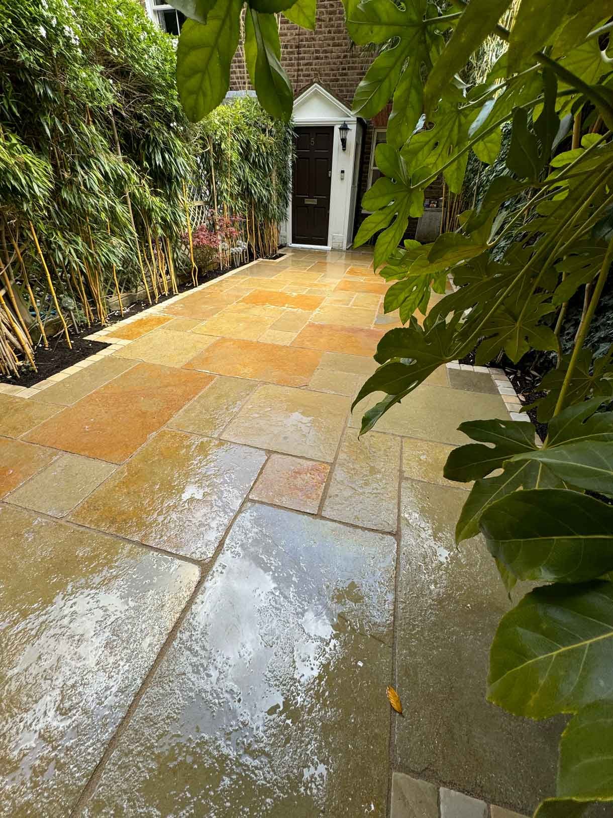 A new limestone patio in the project pack pattern. Beige and warm yellow colours.