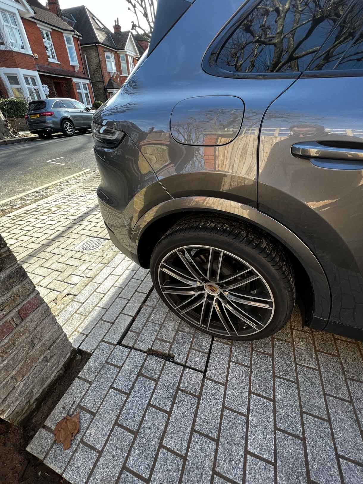 A driveway made from granite setts for this redbrick property in Putney.