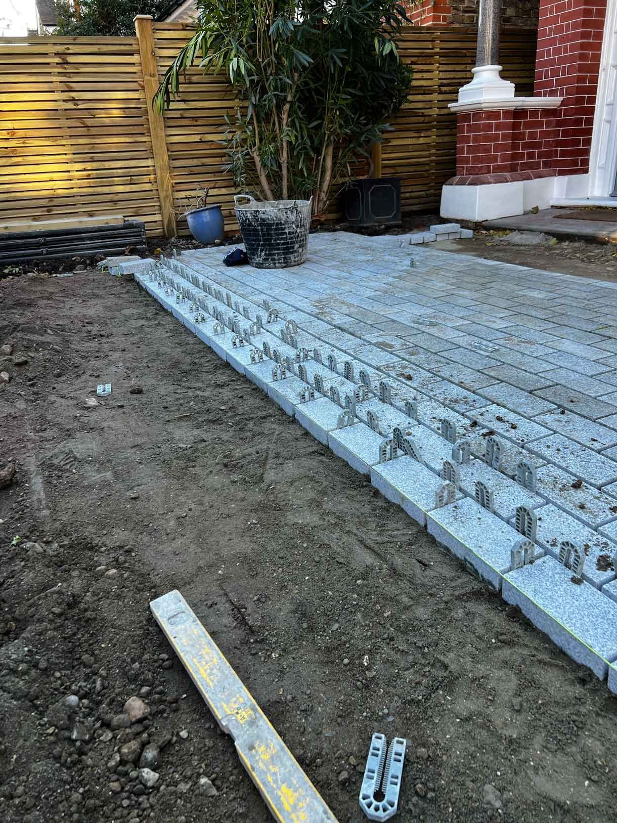 A driveway made from granite setts for this redbrick property in Putney.