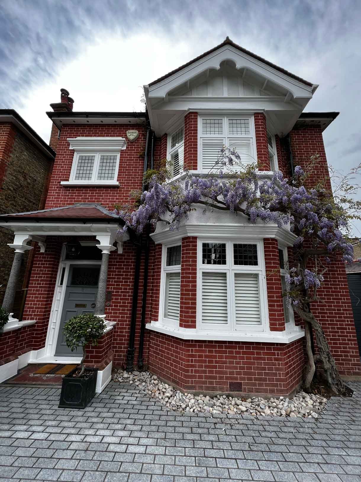 A driveway made from granite setts for this redbrick property in Putney.