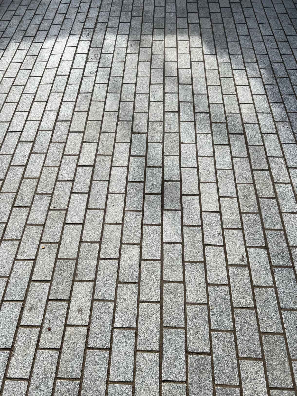 A driveway made from granite setts for this redbrick property in Putney.