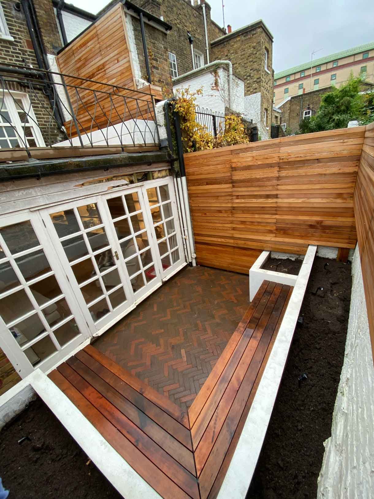 A very small courtyard garden and roof terrace transformed into usable spaces in the heart of Chelsea.