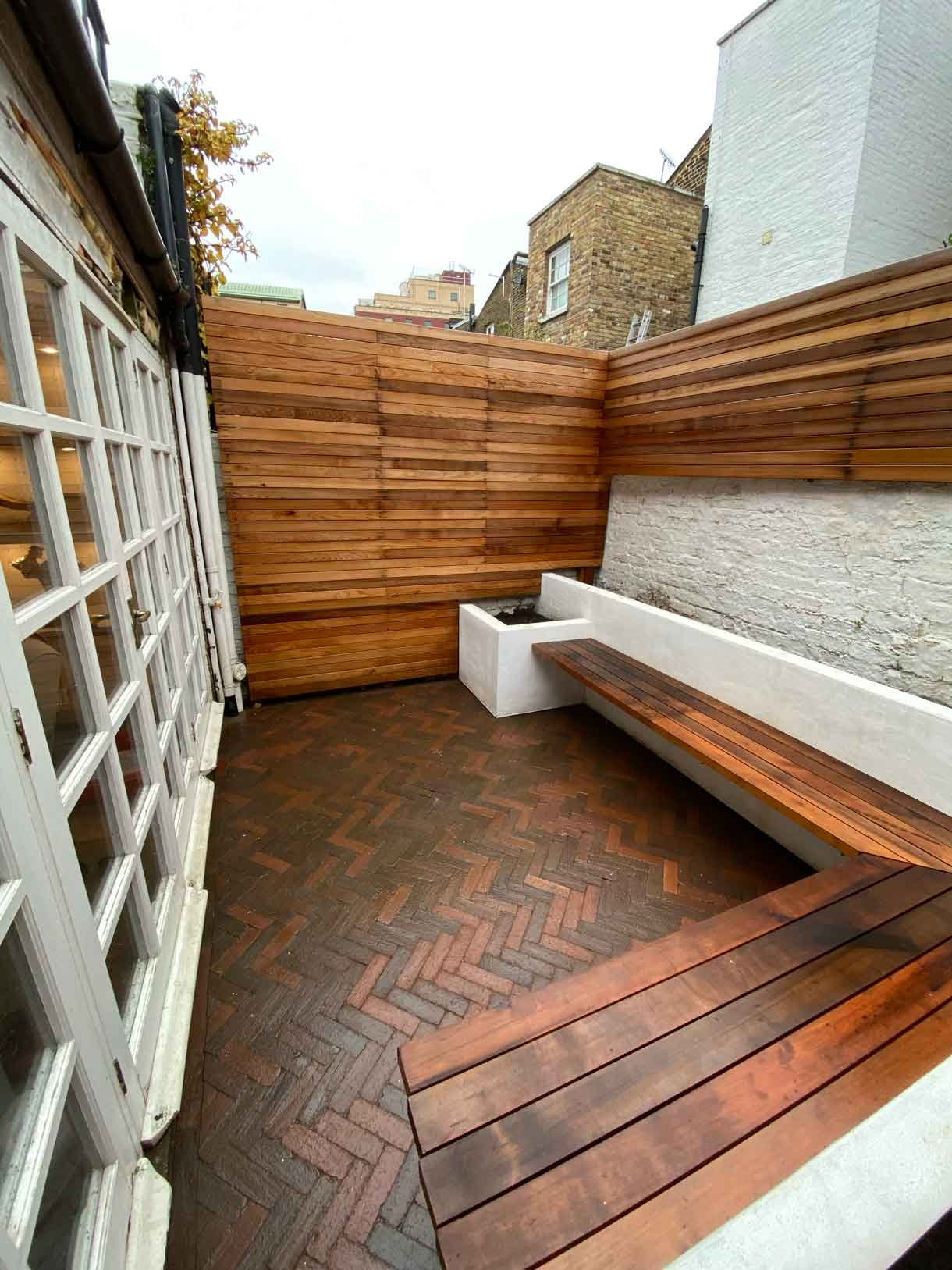 A very small courtyard garden and roof terrace transformed into usable spaces in the heart of Chelsea.