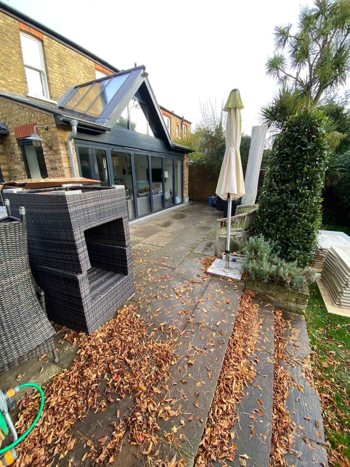 The house before the new patio looking dull and worn out.
