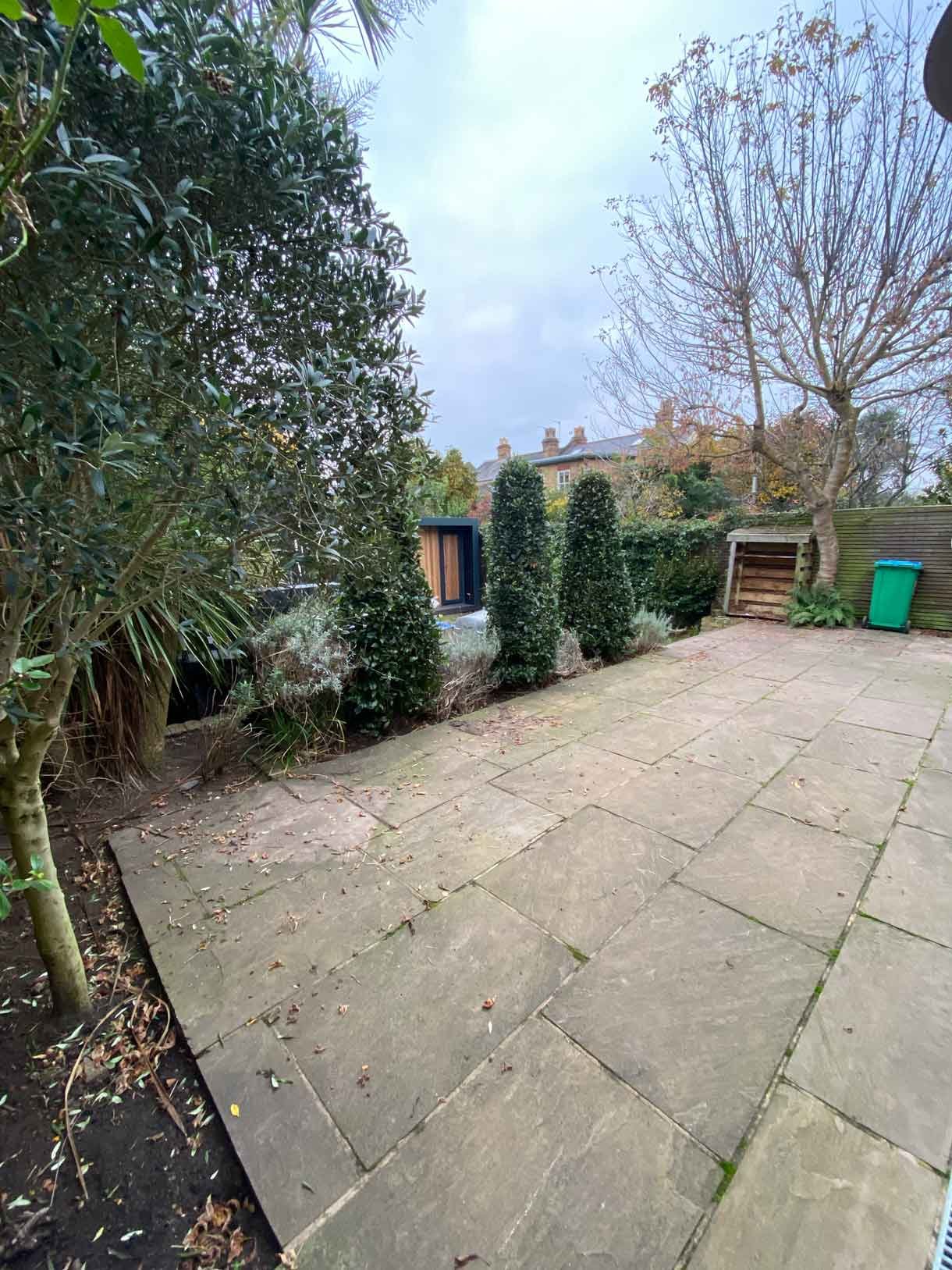 The house before the new patio looking dull and worn out.