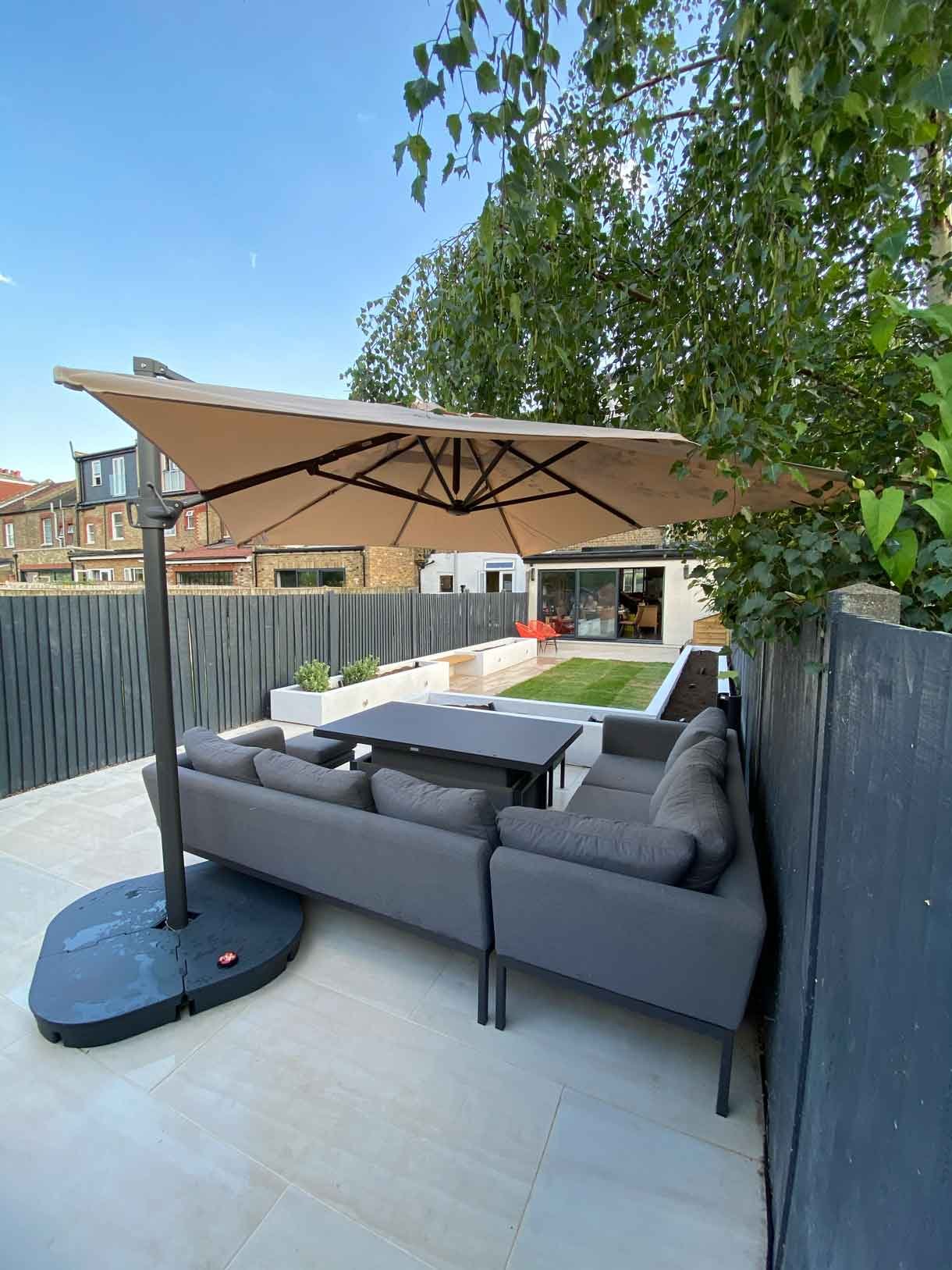 This Tooting garden, previously neglected for decades as a rental property, was transformed into a vibrant and functional outdoor space tailored to the new owners' vision. With a sunny aspect throughout the day, the garden had long been underutilized, but we set out to change that by creating a design that aligned perfectly with the clients' lifestyle and love for outdoor entertaining. We introduced distinct seating areas, raised planters to add structure and greenery, and installed lighting to ensure the garden could be enjoyed from morning until late evening, delivering a welcoming atmosphere that invites relaxation and social gatherings.